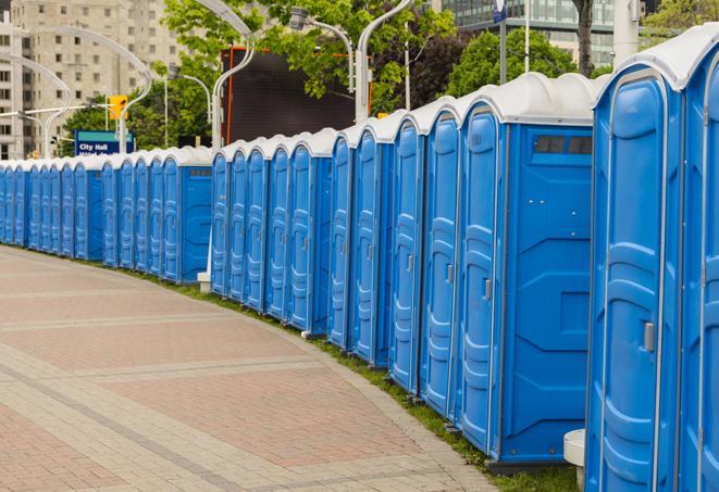 a row of portable restrooms at a fairground, offering visitors a clean and hassle-free experience in levelland